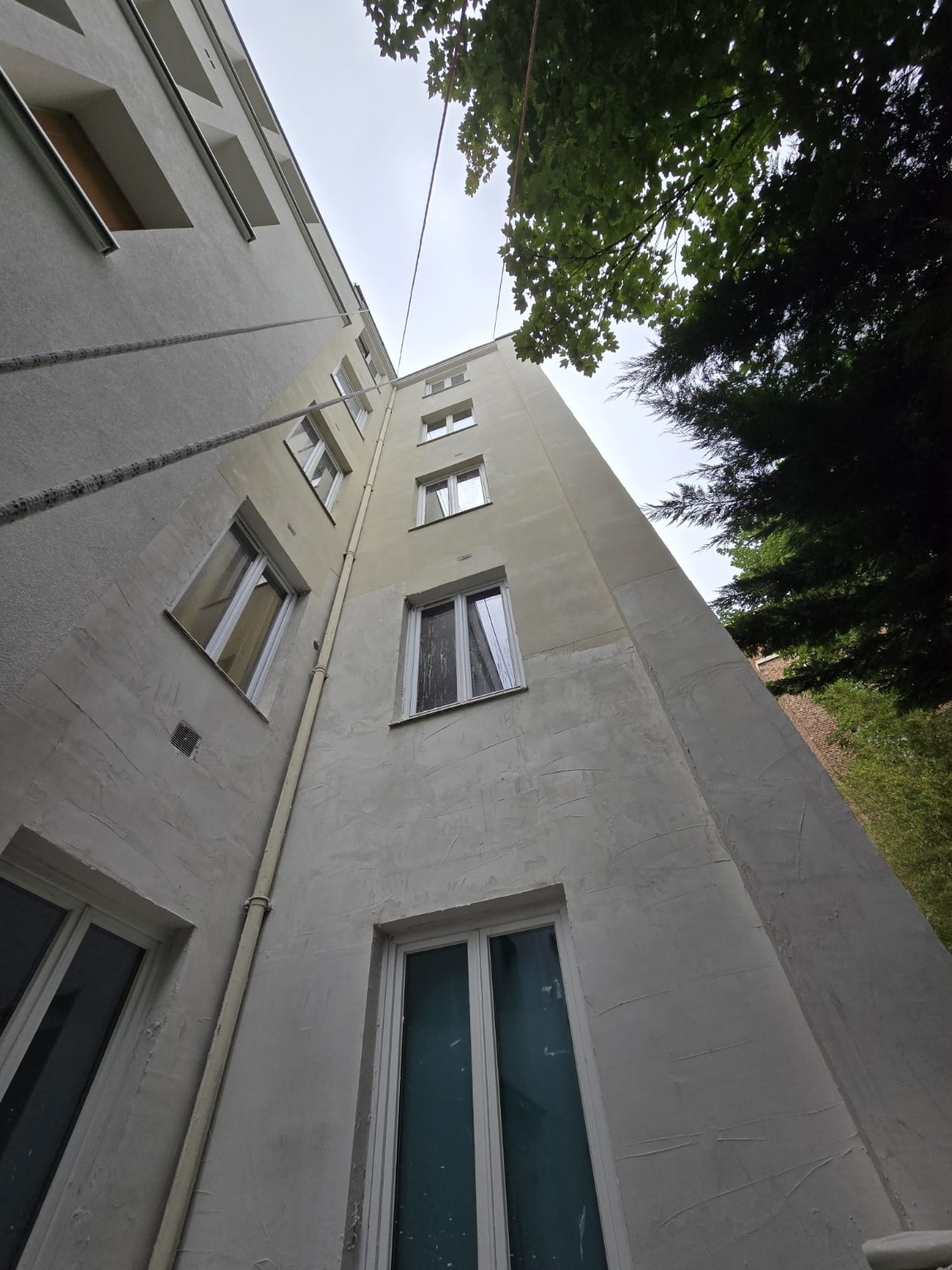 Reprises d’enduit et préparation des façades de la courette