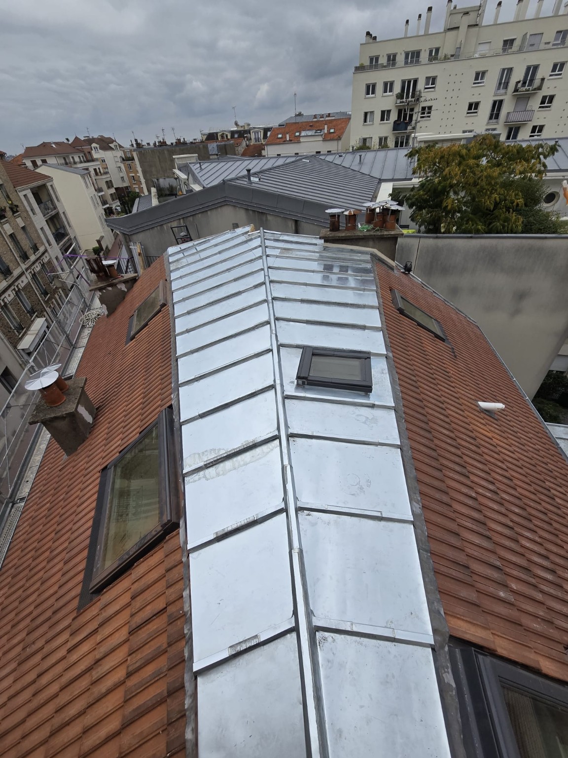 Réfection d’une couverture en zinc à joint debout après intervention