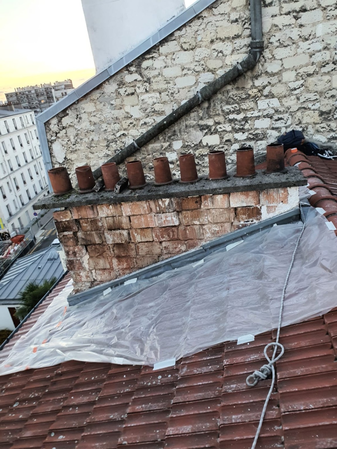 Reprise de maçonnerie en toiture après intervention