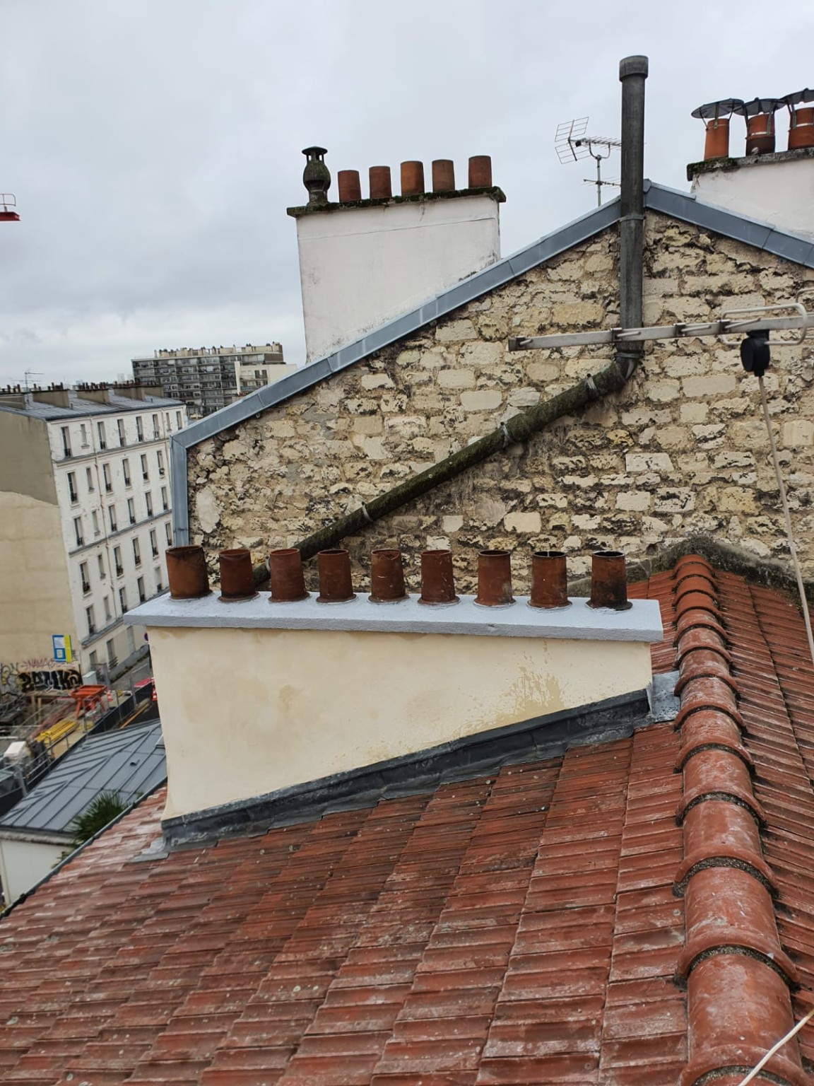 Reprise de maçonnerie en toiture avant intervention